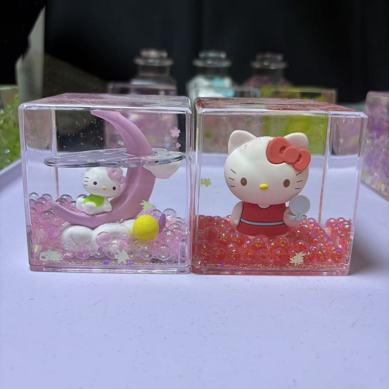 7cm*7cm Clear Square Liquid Floating Shake Ornament Customizable Floating Figure Liquid Hourglass Shake Toy Cute Cartoon Hello Kitty Moon Scene & Lime Ice Cube Stress Relief Fidget Shaker Desk Decor Ornament 2 Pack 69.9 USD Mix & Match Custom Design Avail
