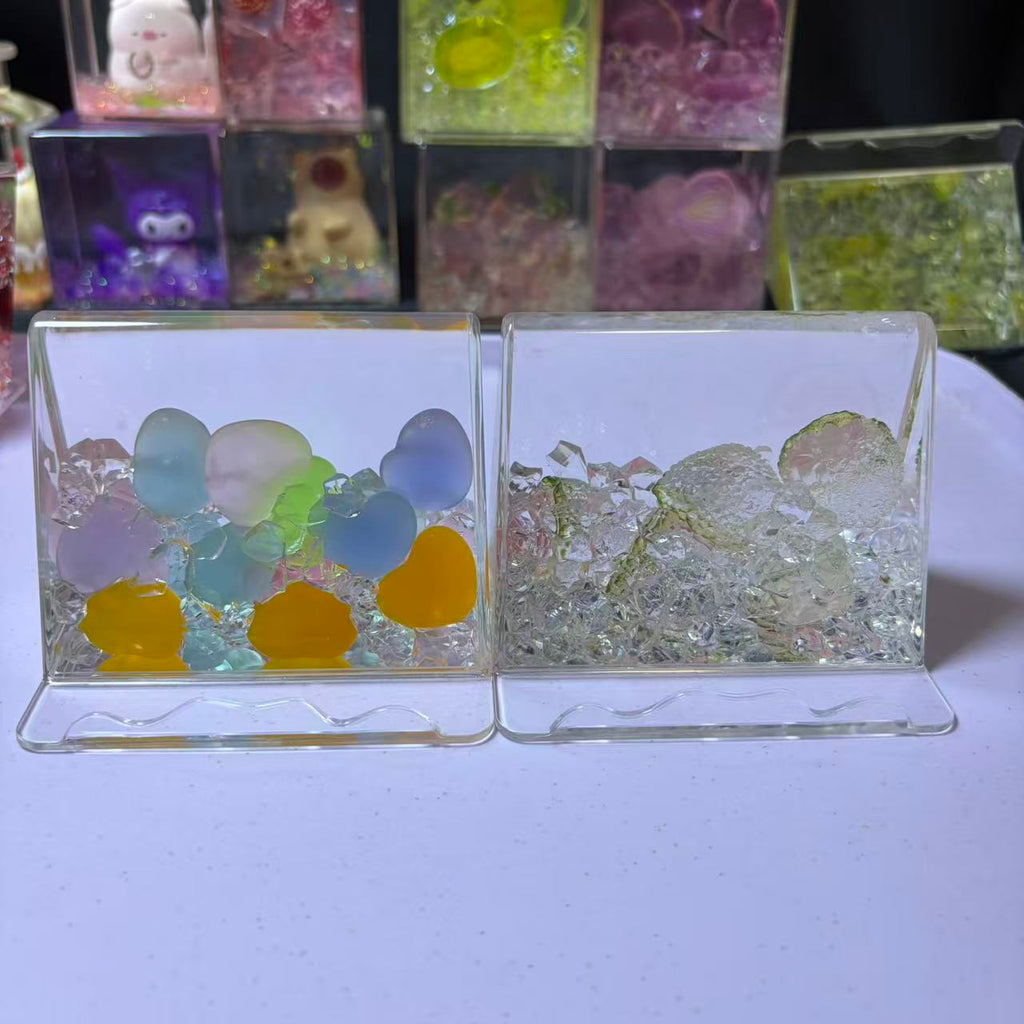 7cm*7cm Clear Square Liquid Floating Shake Ornament Customizable Floating Figure Liquid Hourglass Shake Toy Cute Cartoon Hello Kitty Moon Scene & Lime Ice Cube Stress Relief Fidget Shaker Desk Decor Ornament 2 Pack 69.9 USD Mix & Match Custom Design Avail