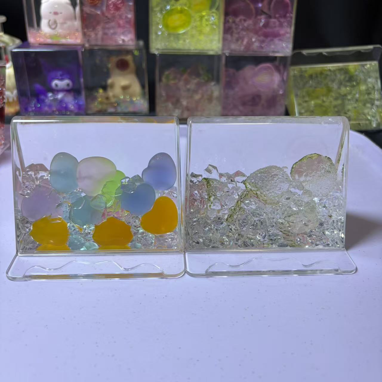 7cm*7cm Clear Square Liquid Floating Shake Ornament Customizable Floating Figure Liquid Hourglass Shake Toy Cute Cartoon Hello Kitty Moon Scene & Lime Ice Cube Stress Relief Fidget Shaker Desk Decor Ornament 2 Pack 69.9 USD Mix & Match Custom Design Avail